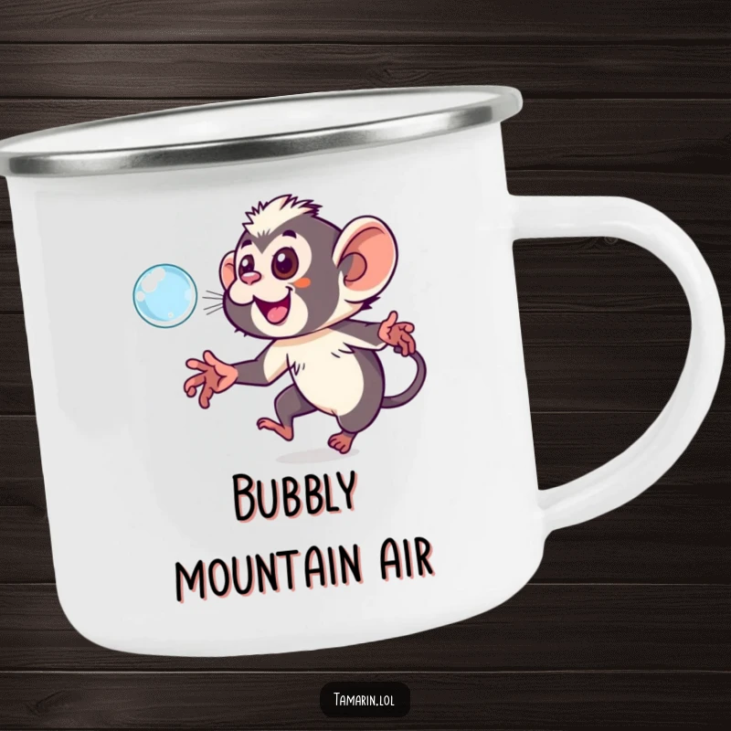 Funny tamarin camping mug showing a playful monkey chasing a shimmering bubble, ideal for drinks in the great outdoors.