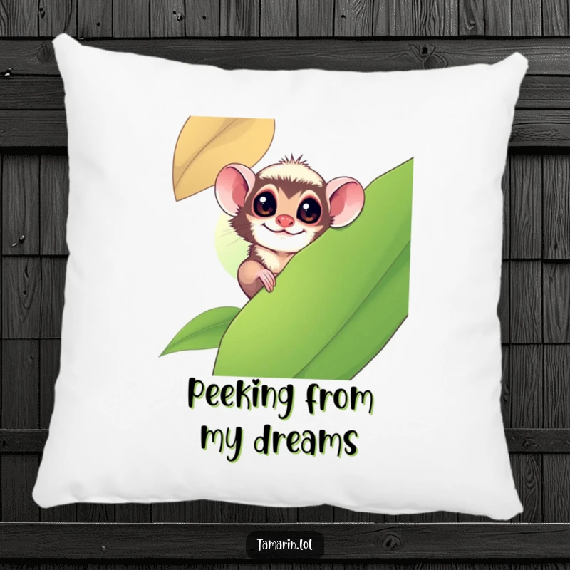 Funny tamarin monkey playfully peeking from behind a large leaf, presented on a soft and comfortable pillow.