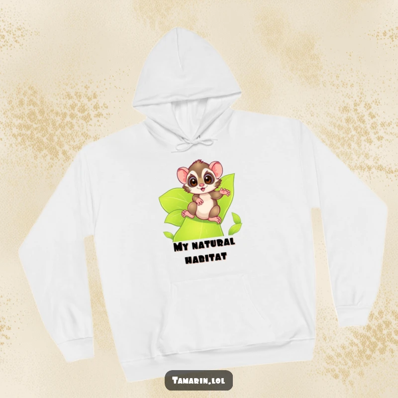 Funny tamarin hoodie, a cozy garment featuring a tamarin with excited eyes sliding down a leafy green slide, radiating adventurous fun.
