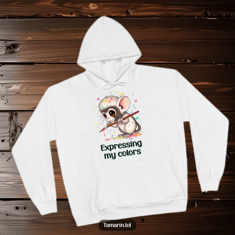 Funny tamarin hoodie, a cozy garment featuring a tamarin artistically splattering colorful paint with a tiny brush, radiating creative energy.
