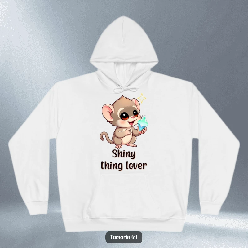 Funny tamarin hoodie featuring a monkey captivated by a sparkling gem, expressing awe and wonder in a cozy, humorous design.