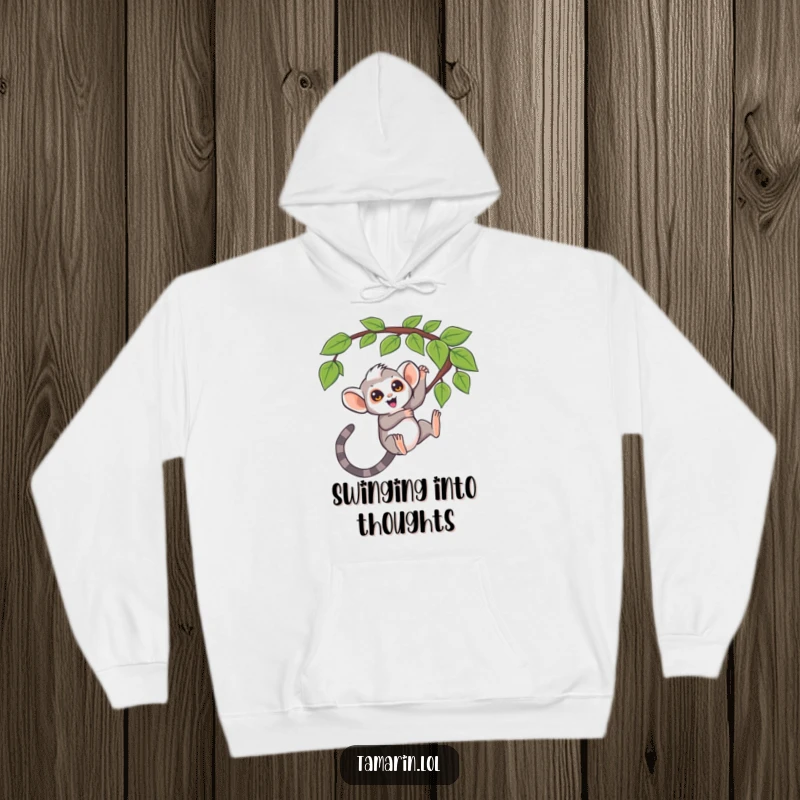 Funny hoodie, tamarin swinging from a question mark vine, curious monkey theme, playful and cozy, perfect funny gift.