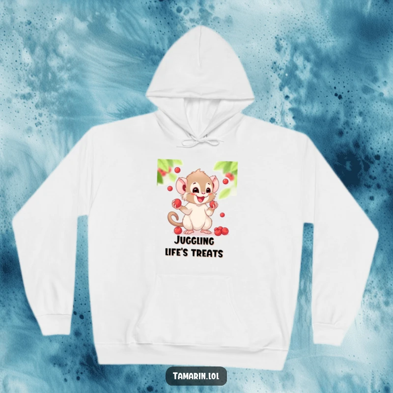 Funny hoodie depicting a tamarin juggling berries with wide eyes and a happy smile, radiating pure amusement.