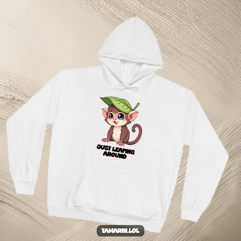 Funny hoodie featuring a tamarin character wearing a leaf as a hat, looking playfully mischievous and ready for some lighthearted fun, perfect for comfort.