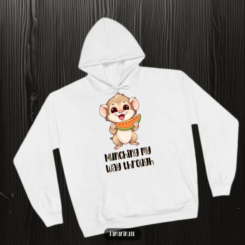 Funny Hoodie featuring an excited tamarin character holding a juicy piece of fruit, perfect for snack lovers.