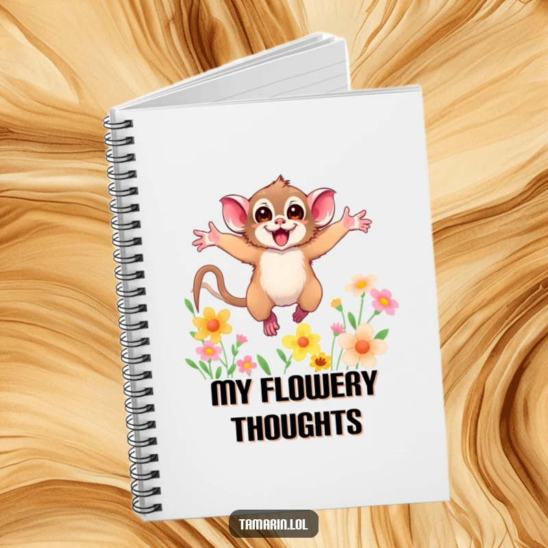 Funny notebook with a tamarin with arms wide open, leaping through colorful flowers, perfect for jotting down whimsical ideas.