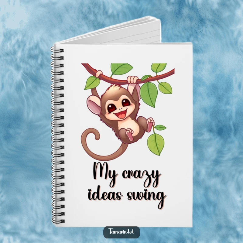 Funny tamarin monkey swinging from a vine on a notebook cover, inspiring energetic note-taking and creativity.