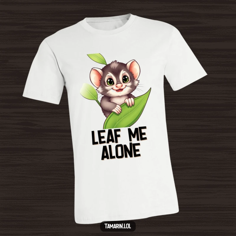 Funny T-Shirt: A tamarin grins mischievously while peeking from a leaf, embodying playful secrets, a great funny gift.