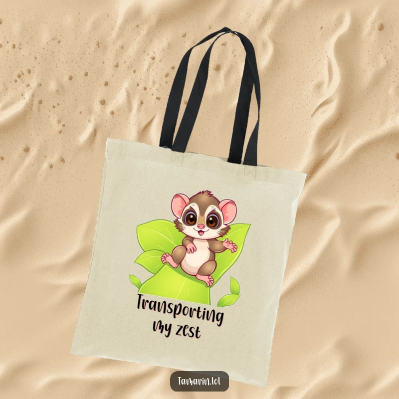 Funny tamarin tote bag, designed with an excited tamarin sliding down a leafy green slide, perfect for carrying essentials with an adventurous flair.